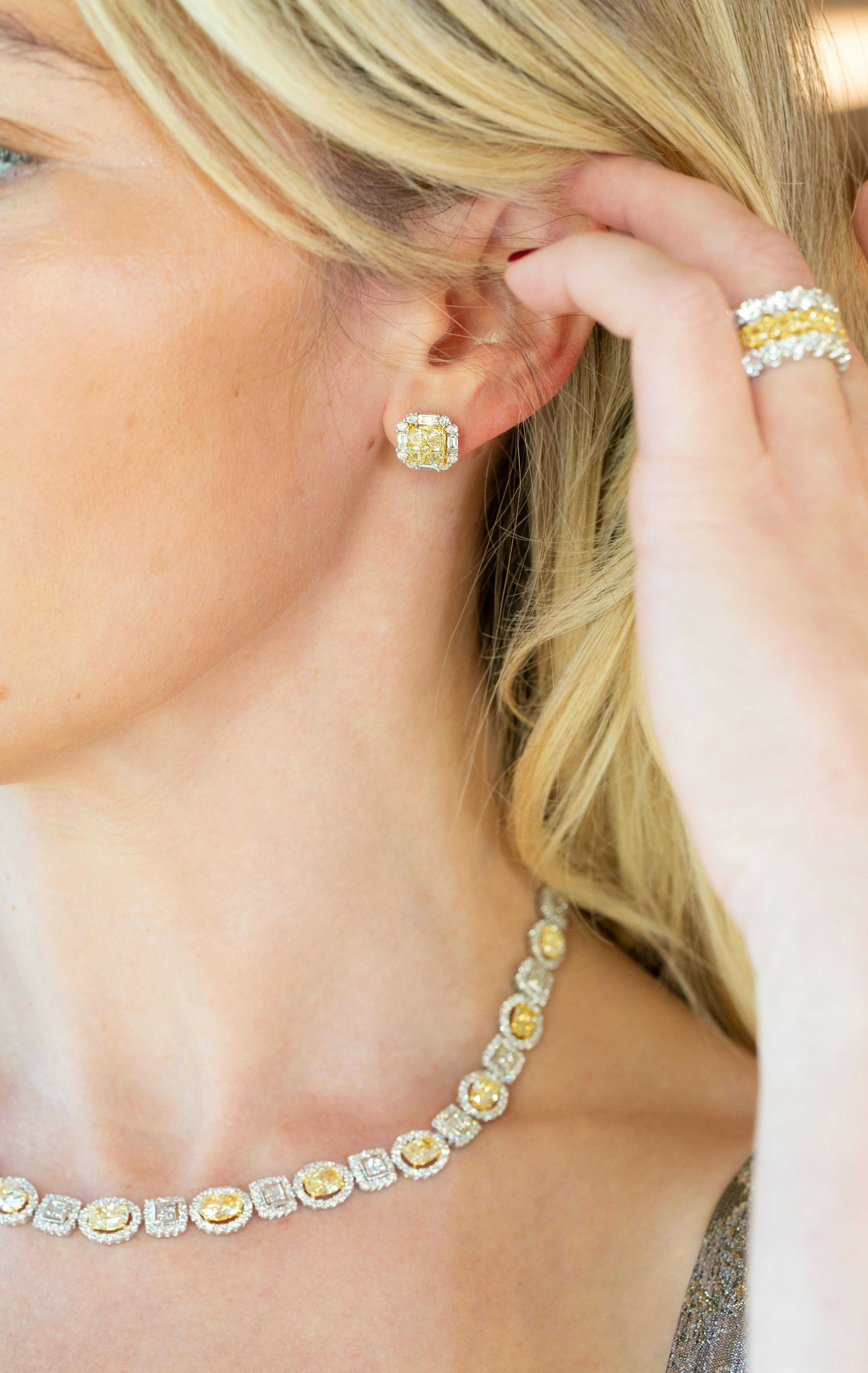 photo of person wearing yellow diamond jewelry